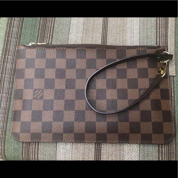 Louis Vuitton Handbags - Louis Vuitton neverfull wristlet